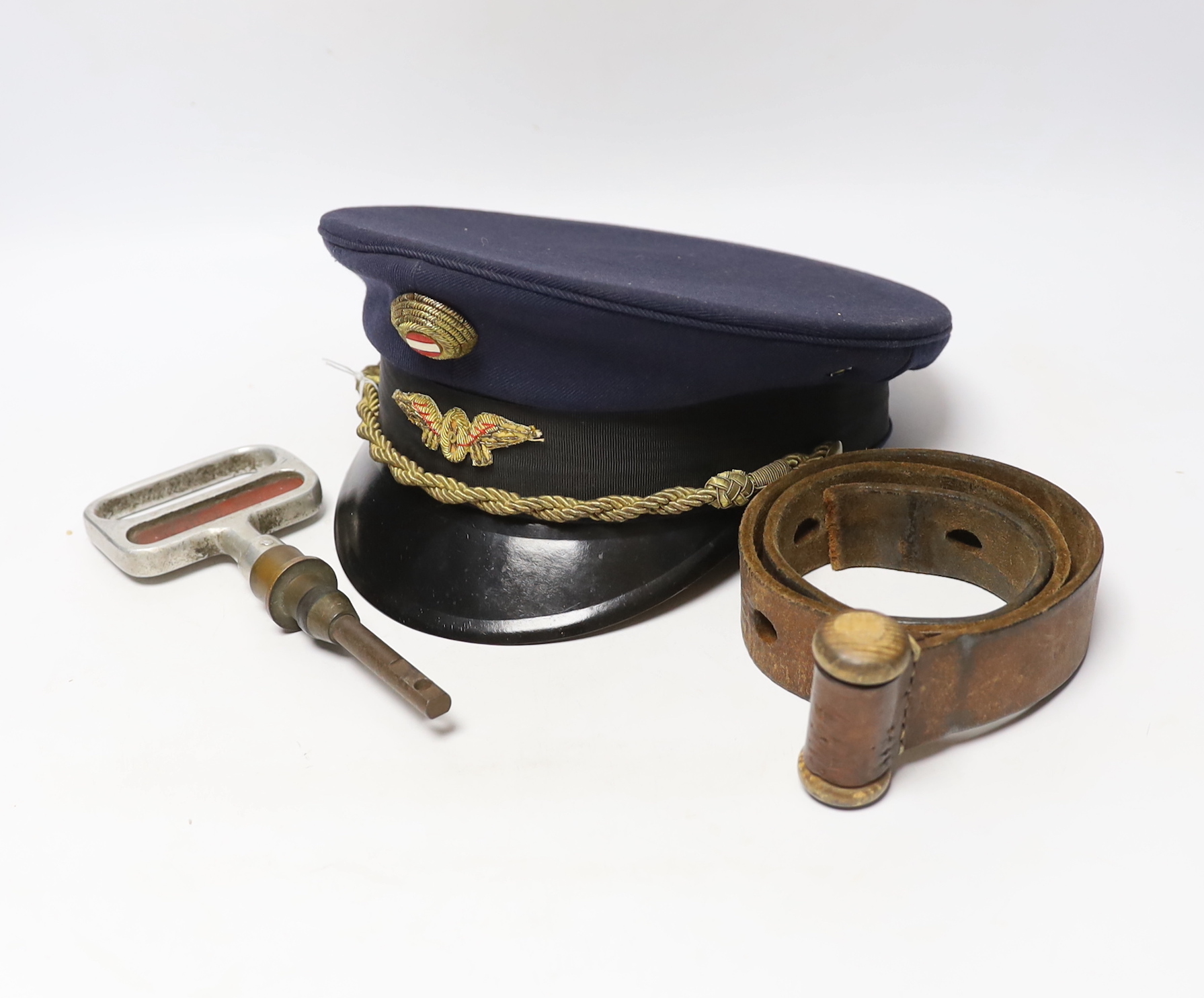 A post WWII Austrian National Railway Guard's hat and original window leather strap and emergency pull (3)